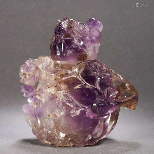 A Carved Amethyst Vase with Cover