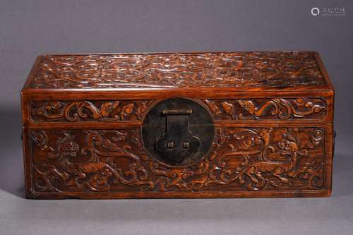 A Carved Huanghuali Dragon Box with Cover