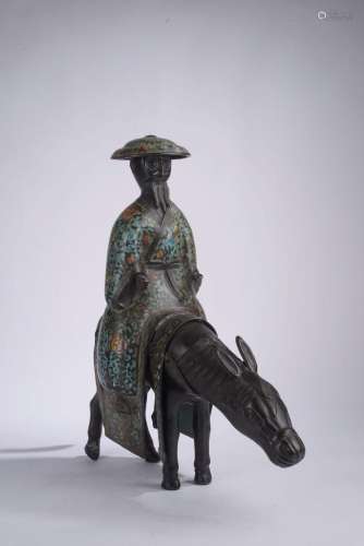 CHINE - XXe siècle.<br />
Statuette de Toba sur sa mule en b...