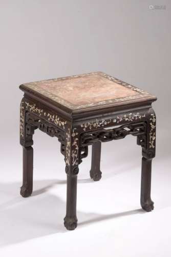 INDOCHINE - XIXe siècle. <br />
Tabouret en bois incrusté de...