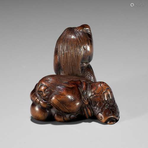 TSUNEYOSHI: A RARE NAGOYA SCHOOL WOOD NETSUKE OF TWO DRUNKEN...