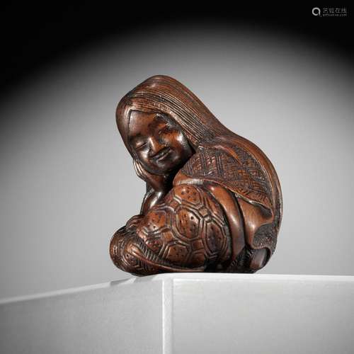 MASATOSHI: A NAGOYA SCHOOL WOOD NETSUKE OF A SLUMBERING SHOJ...