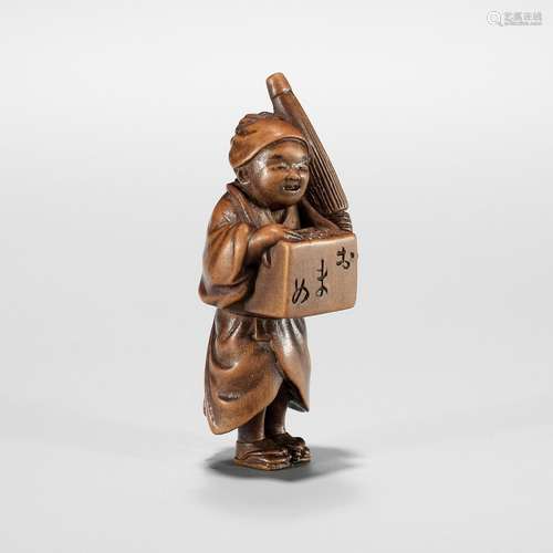 MASANAO: A SMALL WOOD NETSUKE OF A BEAN VENDOR