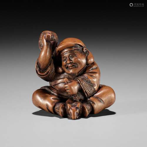 MASANAO: A RARE WOOD NETSUKE OF DAIKOKU CARVING A RAT