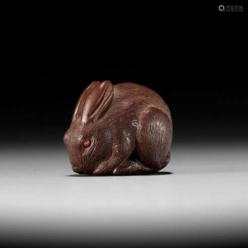 【†】 KOKEI: A FINE AND RARE WOOD NETSUKE OF A HARE