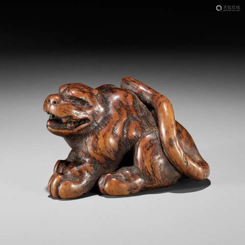 【†】 KOKEI: A WOOD NETSUKE OF A TIGER