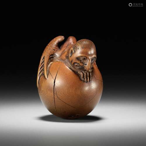 JOBUN: A SUPERB WOOD NETSUKE OF A HATCHING TENGU (TENGU NO T...