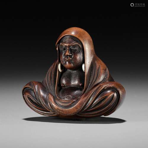 SHUGETSU SHIZAN: A LARGE WOOD NETSUKE OF DARUMA