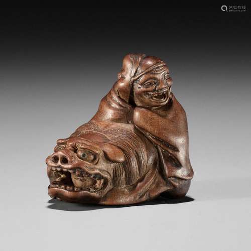 MIWA: A FINE WOOD NETSUKE OF TWO SHISHIMAI PERFORMERS