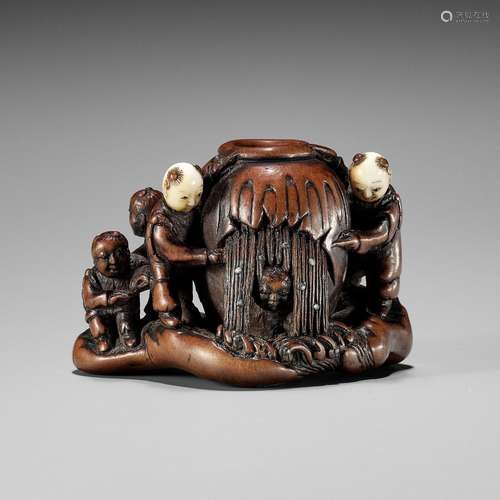 A LARGE WOOD NETSUKE DEPICTING THE STORY OF SHIBA ONKO