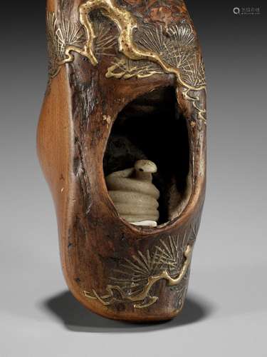 TOYO: A RARE AND UNUSUAL LACQUERED ROOT WOOD NETSUKE OF A SN...