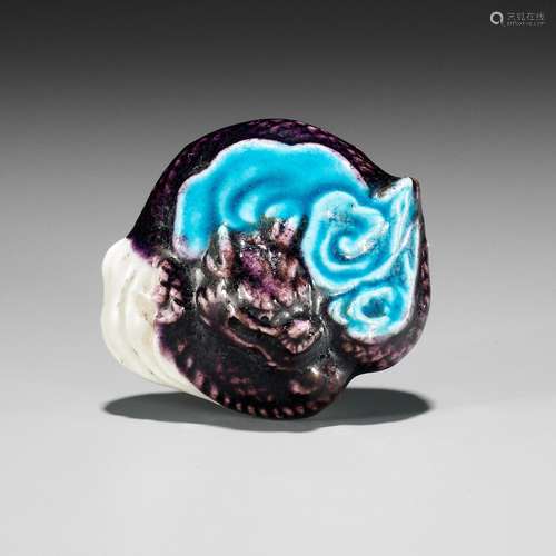 A RARE NANKI OTOKAYAMA GLAZED PORCELAIN NETSUKE OF A DRAGON ...