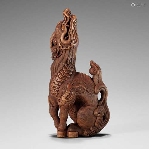 VADYM PYVOVAR: A WOOD NETSUKE OF A KIRIN AFTER SANKO