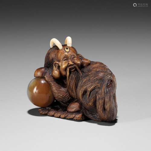 【†】 ALEXANDER DERKACHENKO: A WOOD NETSUKE OF A HAKUTAKU