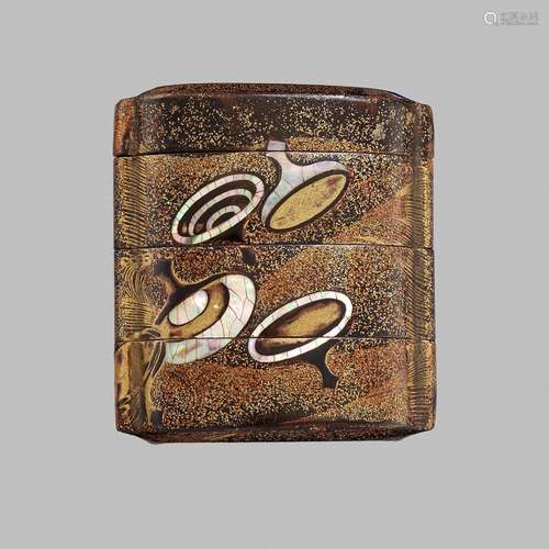 A LACQUER THREE-CASE INRO WITH SPINNING TOPS (KOMA), ATTRIBU...