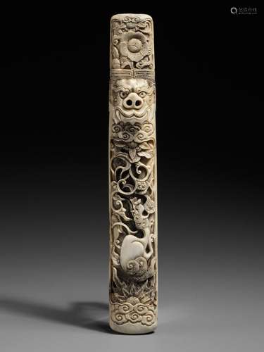 A STAG ANTLER KISERUZUTSU DEPICTING A KIRIN AND SHISHI HEAD,...