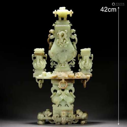 A Chinese Archaistic Carved Jade Vessel