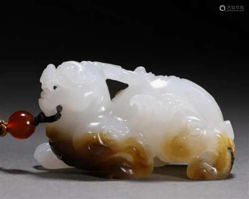 A Chinese Carved White Jade Mythical Beast