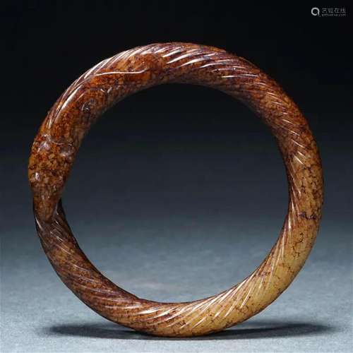 A Chinese Archaistic Twist Jade Bangle