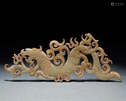 A Chinese Archaistic Carved Jade Dragon