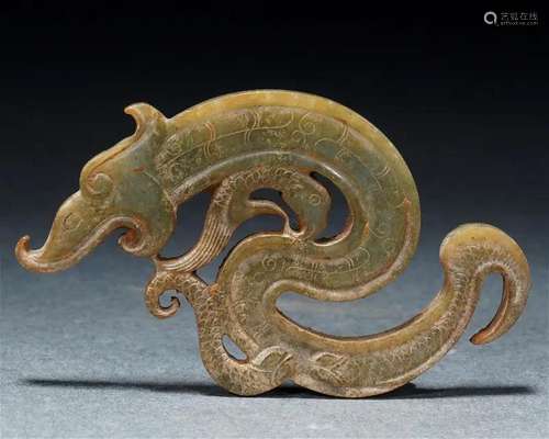 A Chinese Archaistic Carved Jade Dragon