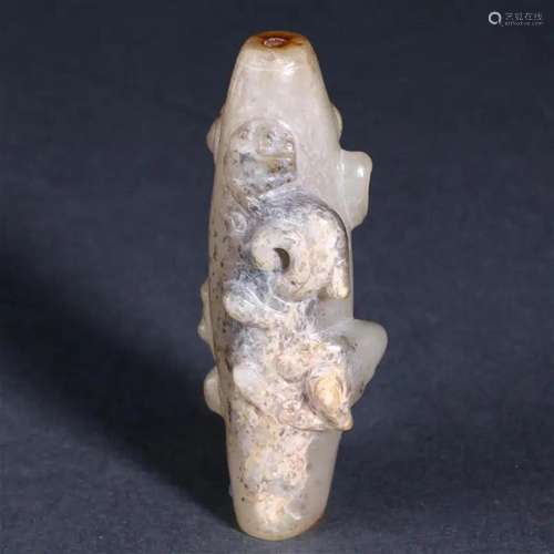 A Chinese Carved Jade Chilong Bead