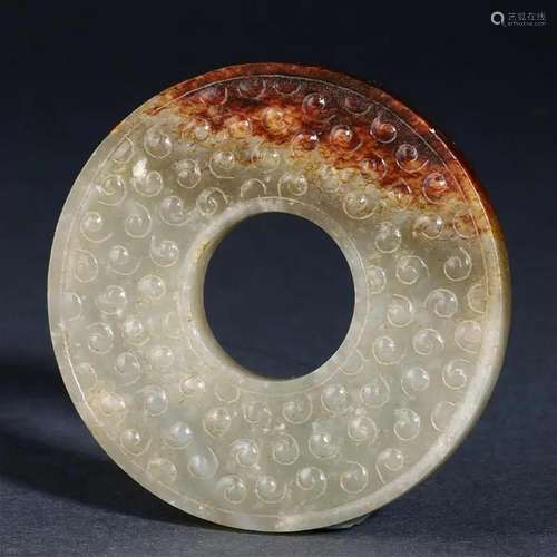 A Chinese Carved Jade Disc Bi