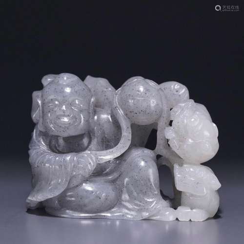 Hetian jade boy playing with a lion