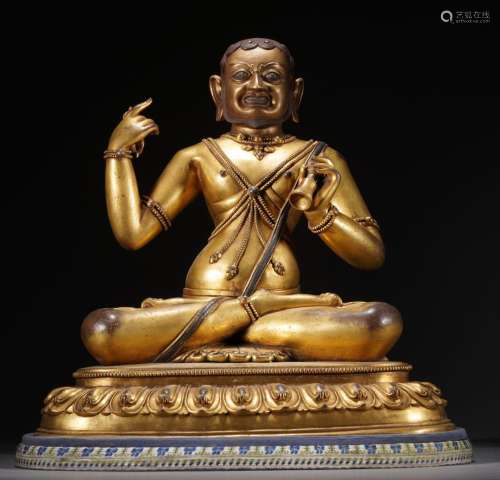 Gilt-bronze Figure of a seated guru