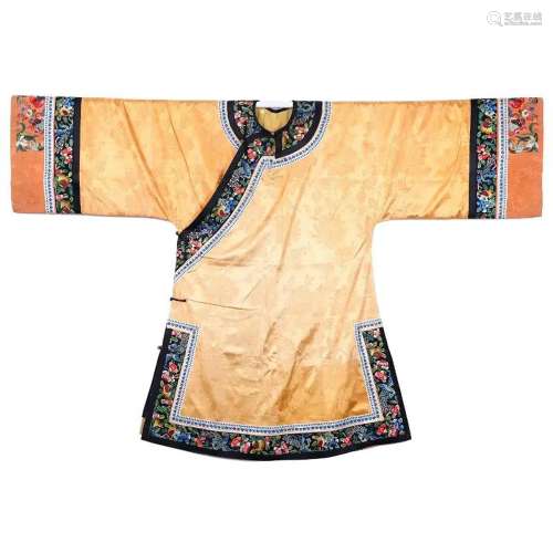 A YELLOW-GROUND SATIN ROBE WITH DARK FLORAL BORDER