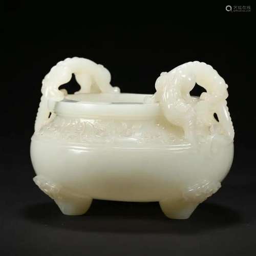 A WHITE JADE INCENSE BURNER WITH BEAST HANDLES