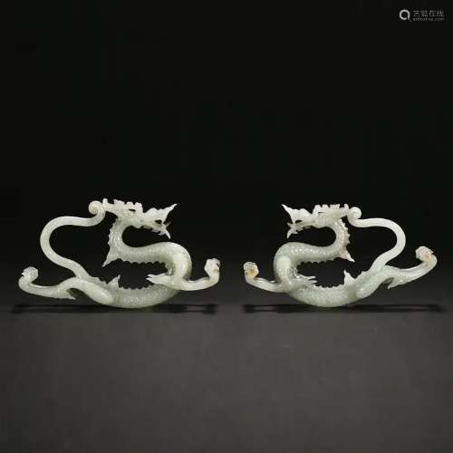 A PAIR OF WHITE JADE DRAGON ORNAMENTS