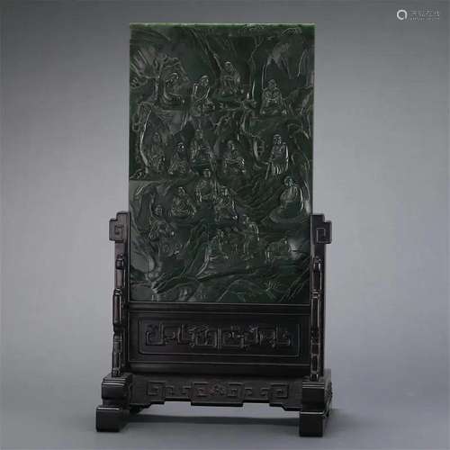 A SPINACH GREEN JADE 'EIGHTEEN ARHATS' TABLESCREEN