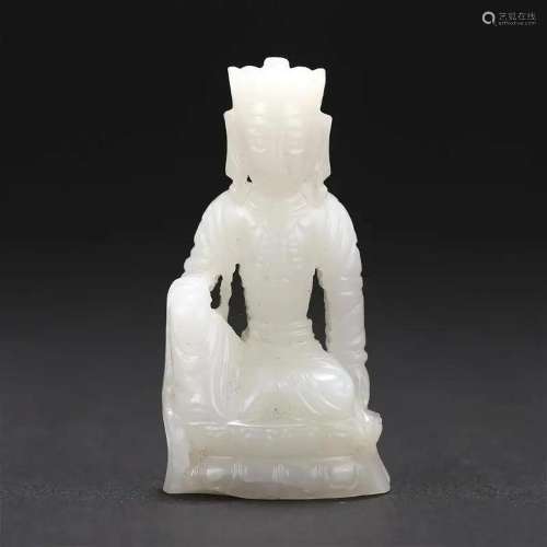 A WHITE JADE SEATED MANJUSHRI BUDDHA FIGURE