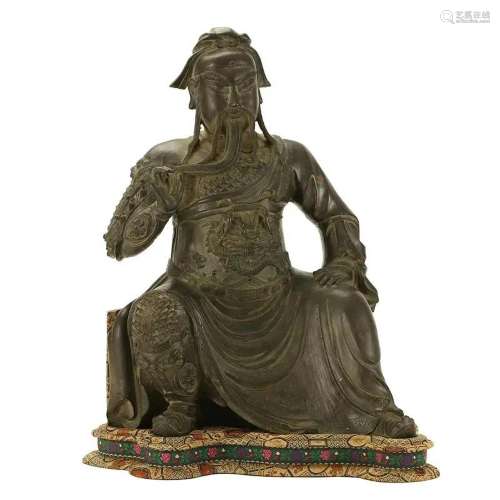A BRONZE SEATED FIGURE OF GUAN GONG