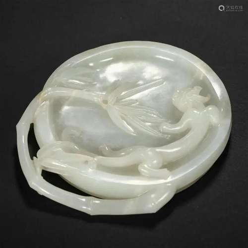 A WHITE JADE 'CHILONG' WASHER
