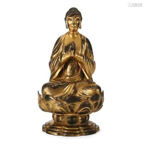 A BRONZE GILT SEATED FIGURE OF SHAKYAMUNI BUDDHA