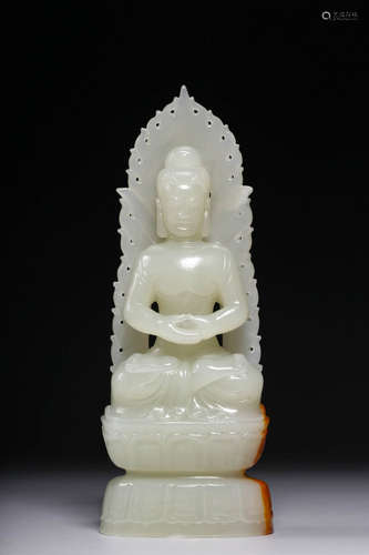 In the Qing Dynasty, a seated statue of the Tathagata Buddha...