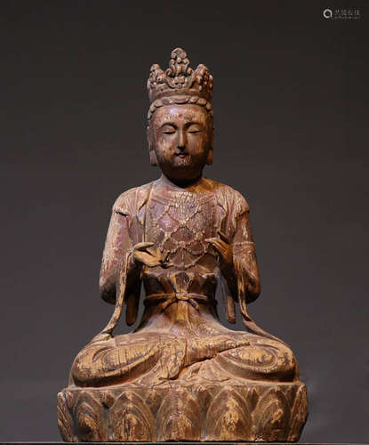 Before or during the Ming Dynasty, a wooden statue of Guanyi...