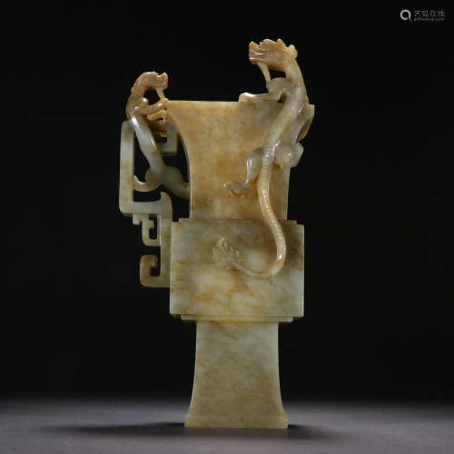 In the Qing Dynasty, Hotan Jade was carved with dragon patte...