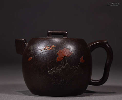 During the Qing Dynasty, the purple sand lotus teapot