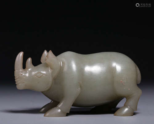 In the Qing Dynasty, Hotan Jade rhinoceros handle