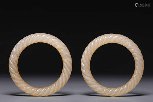 Before or during the Ming Dynasty, a pair of twisted silk ca...