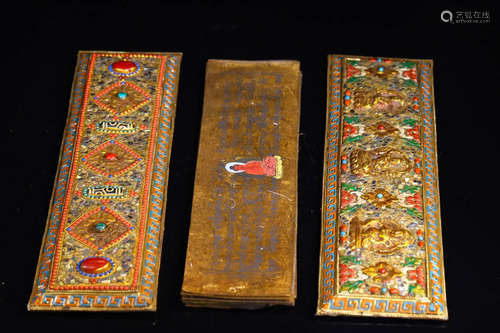 Before or during the Ming Dynasty, carved and colored script...