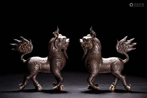 In the Qing Dynasty, a pair of silver kylin auspicious beast...