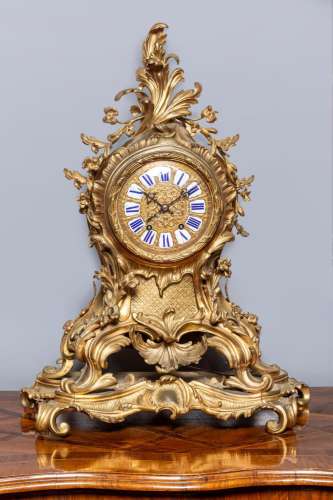 A large and impressive Louis XV style gilt-bronze clock,the ...