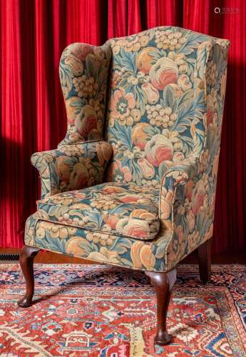 A George I mahogany and needlework tapestry wing-back armcha...