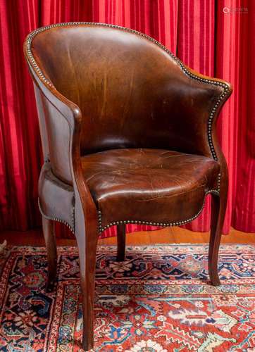 An unusual George III mahogany and leather upholstered desk ...