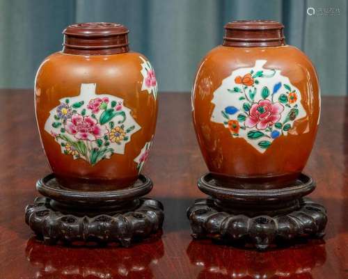 A pair of Chinese café-au-lait ground famille-rose jars,Qing...