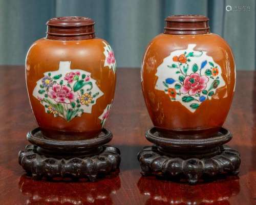 A pair of Chinese café-au-lait ground famille-rose jars,Qing...